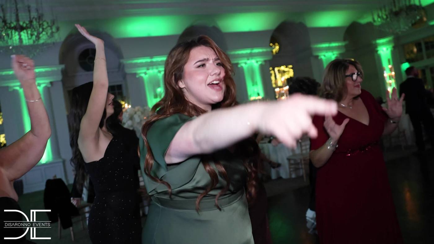 Packed dance floor under colour