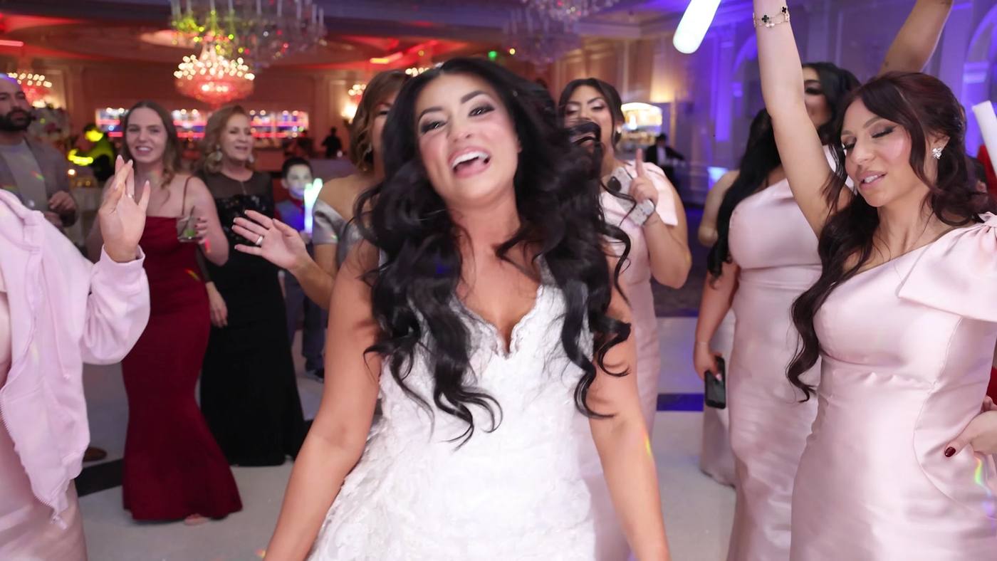 Bride celebrating with her bridesmaids